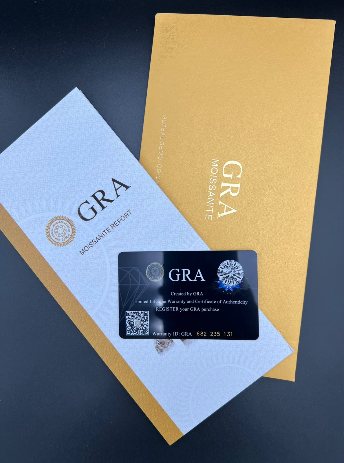 GRA moissanite report, envelope and certificate card